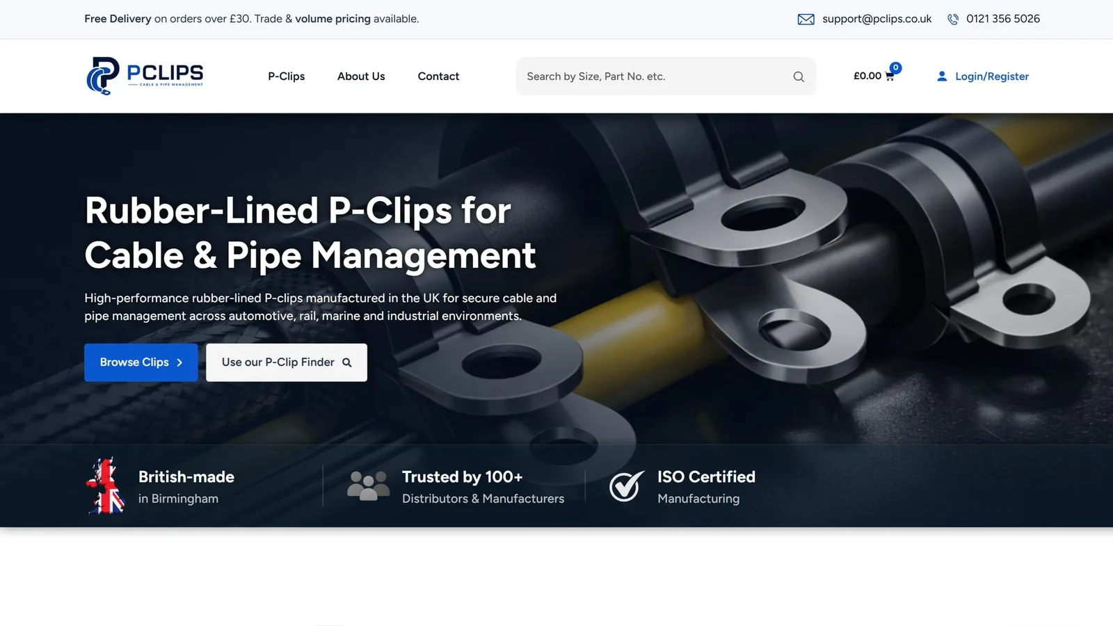 P-Clips homepage hero — Rubber-Lined P-Clips for Cable & Pipe Management — showing a close-up product photograph of rubber-lined steel P-clips with the trust strip 'British-made in Birmingham · Trusted by 100+ Distributors & Manufacturers · ISO Certified' beneath.